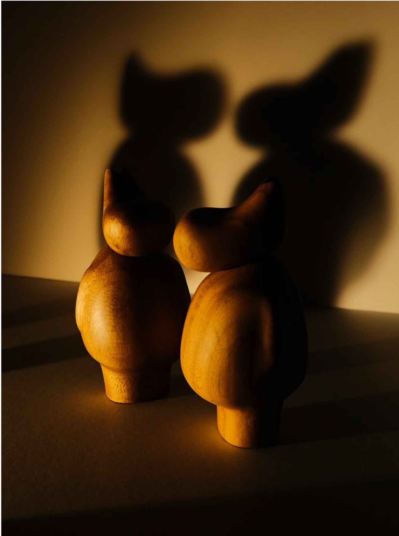 Two wood D’HiPPOs by Flitch & Grain, side by side